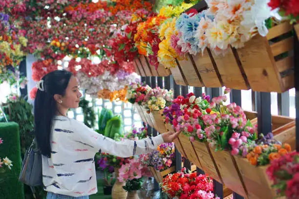 woman in flower shop dubai