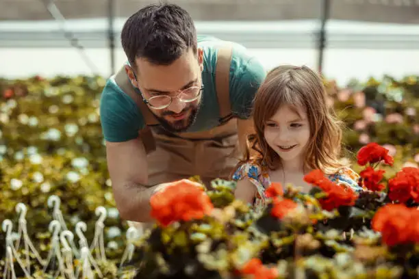 Girl getting assistance from florist at top flower shop in Ajman