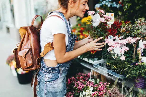 Girl Thinking To Buy Flower Dubai Starting 100 AED